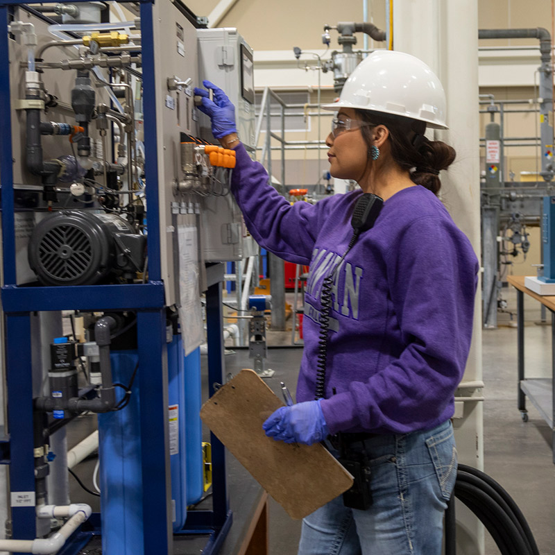SJC Student working on equipment in the SJC School of Energy