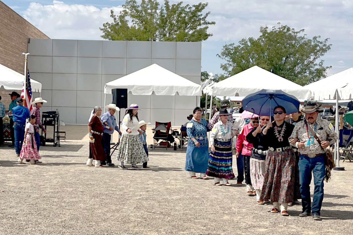A group of Native American dancers in a circle