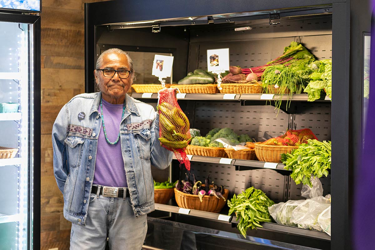 Harvest Food Hub products and people in the shop.